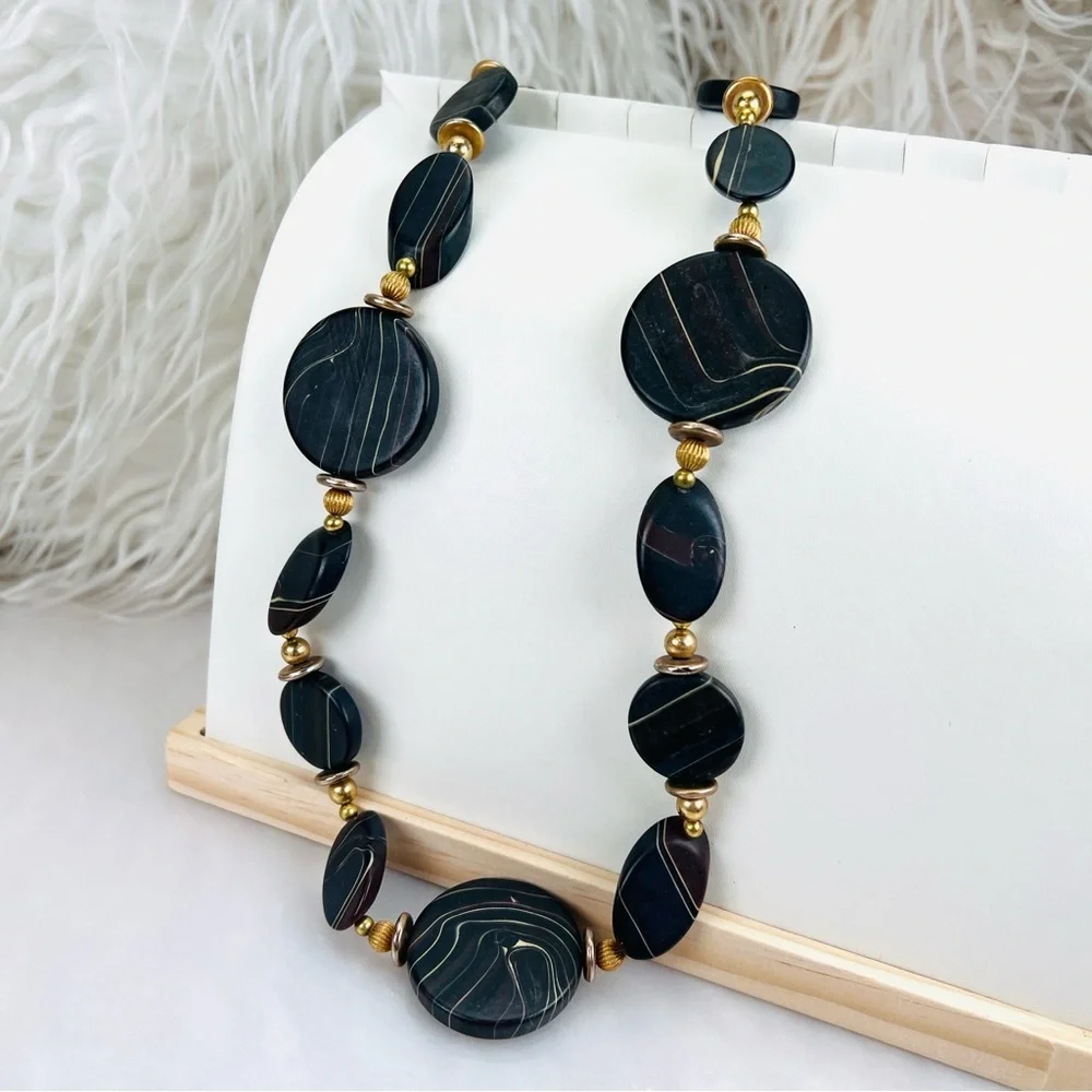 Pretty black swirl, and goldtone costume necklace
